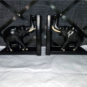 VINTAGE HAND CARVED EBONY WOOD ELEPHANT BOOKENDS Bovine Tusks Eyes and Toenails